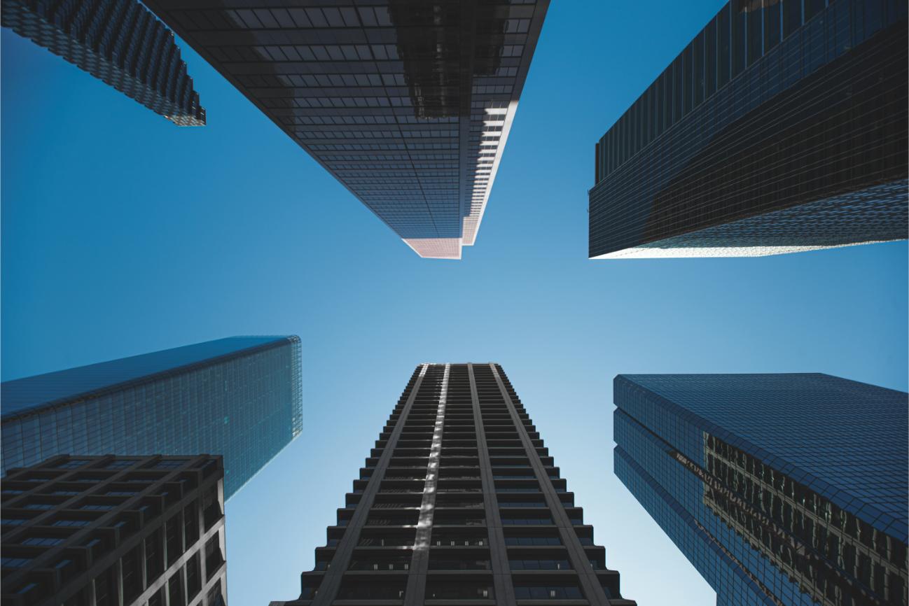 Looking up at skyscrapers